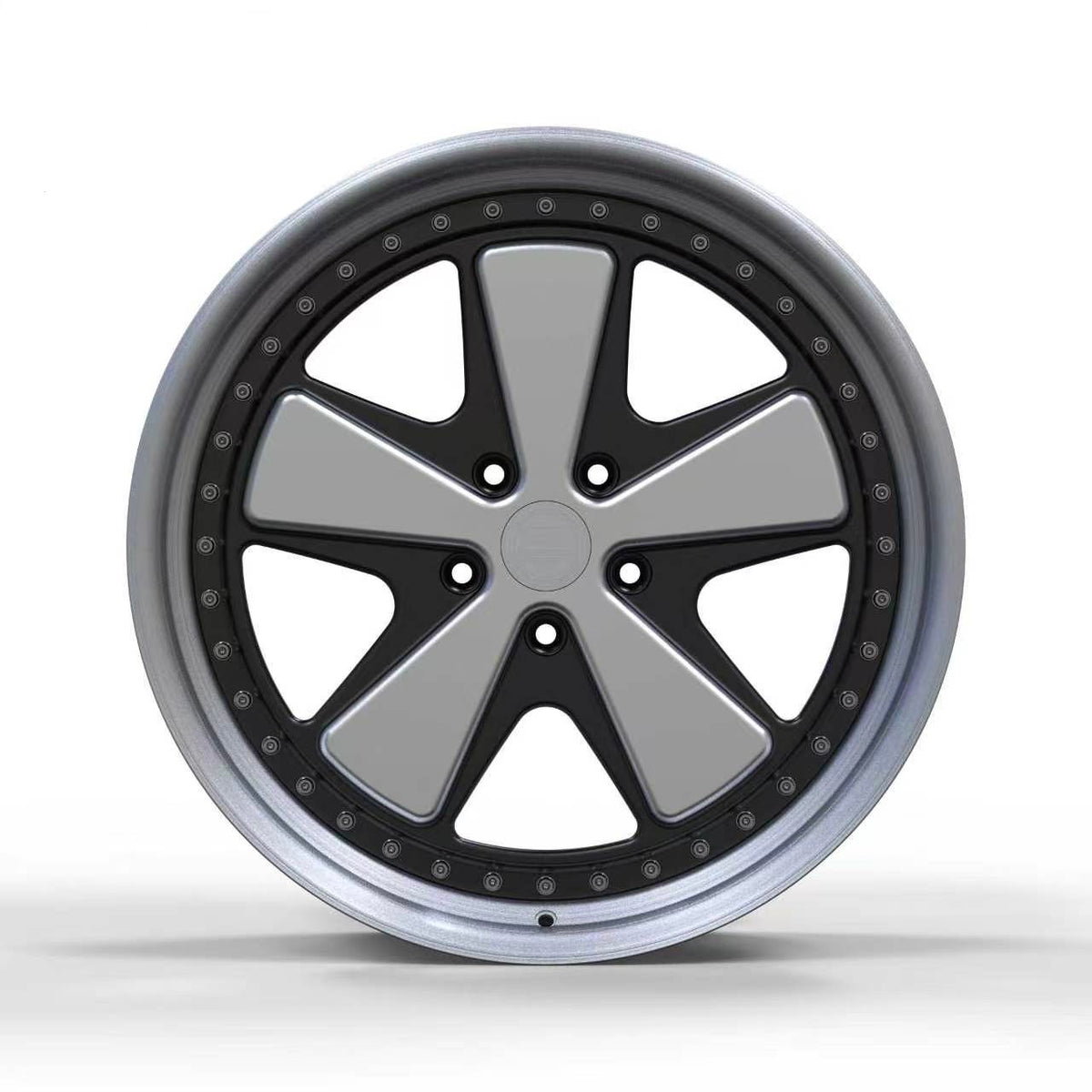 Superior Forged Porsche FUCH Style Comp multi-piece wheel, front view with silver spokes, black recesses, and exposed assembly hardware